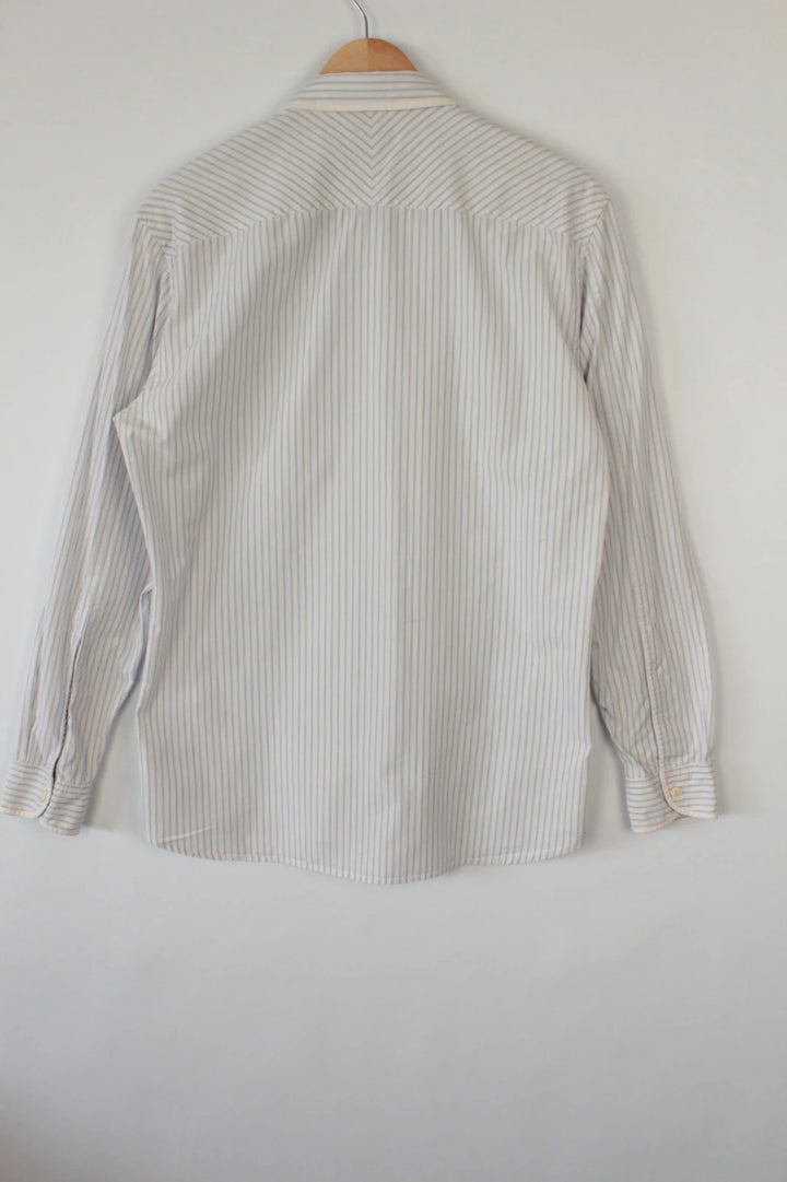 Paul Smith blue and white striped popover shirt with fine vertical pinstripes.