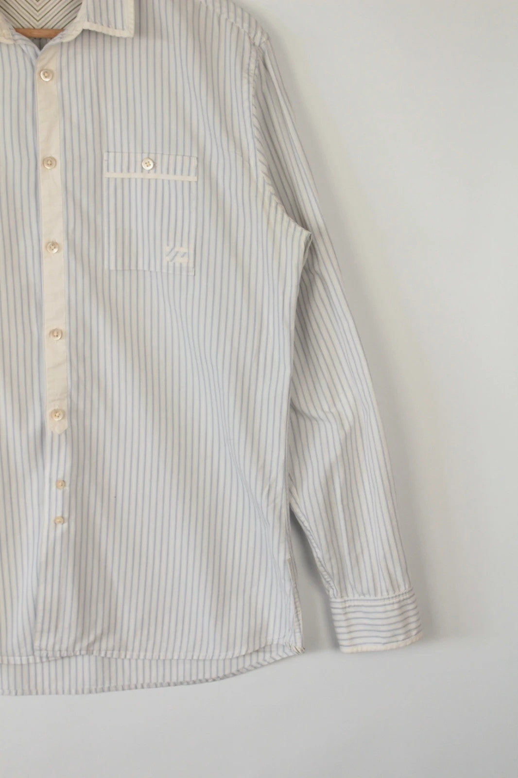 Paul Smith blue and white striped popover shirt with fine vertical pinstripes.