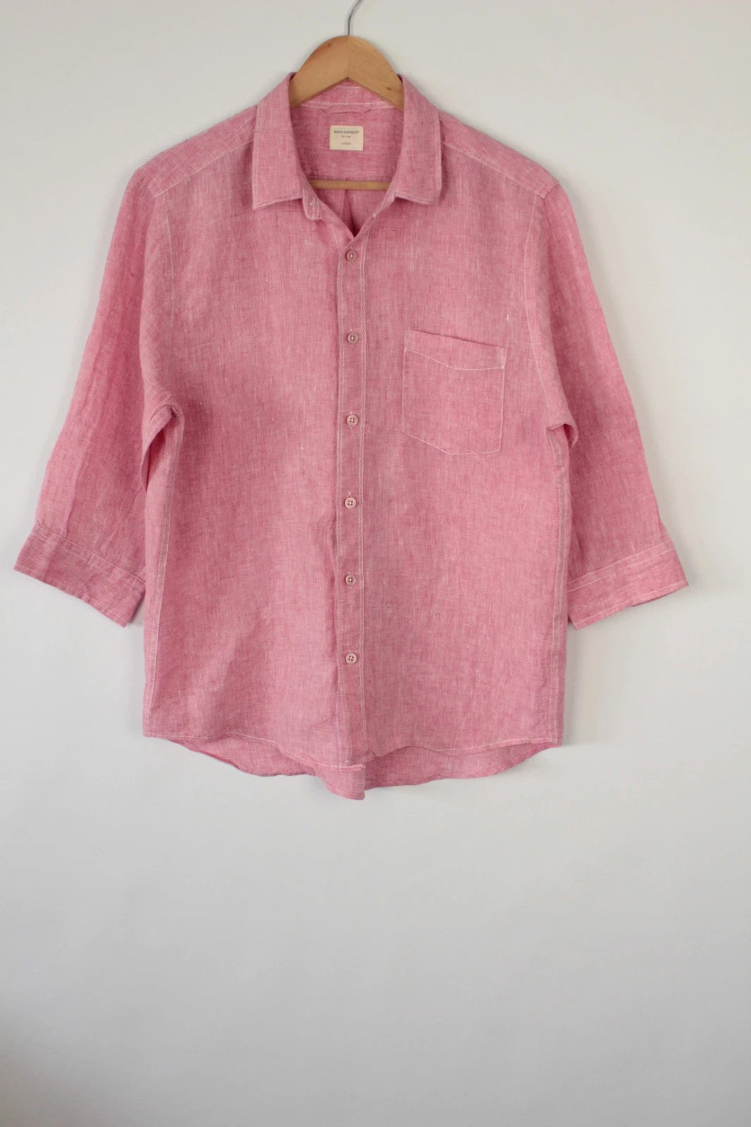 Back Number coral pink linen button-down blouse with three-quarter sleeves and relaxed fit.