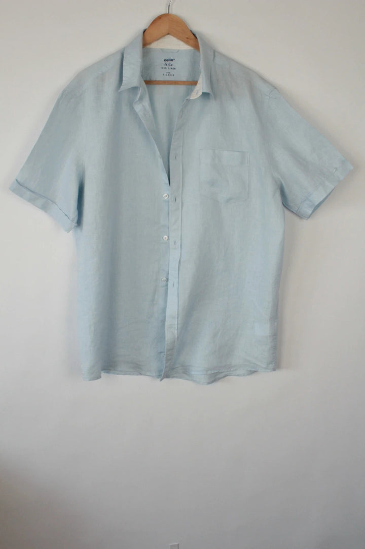Celio short sleeve shirt baby blue 100% linen with button-down front and relaxed fit.