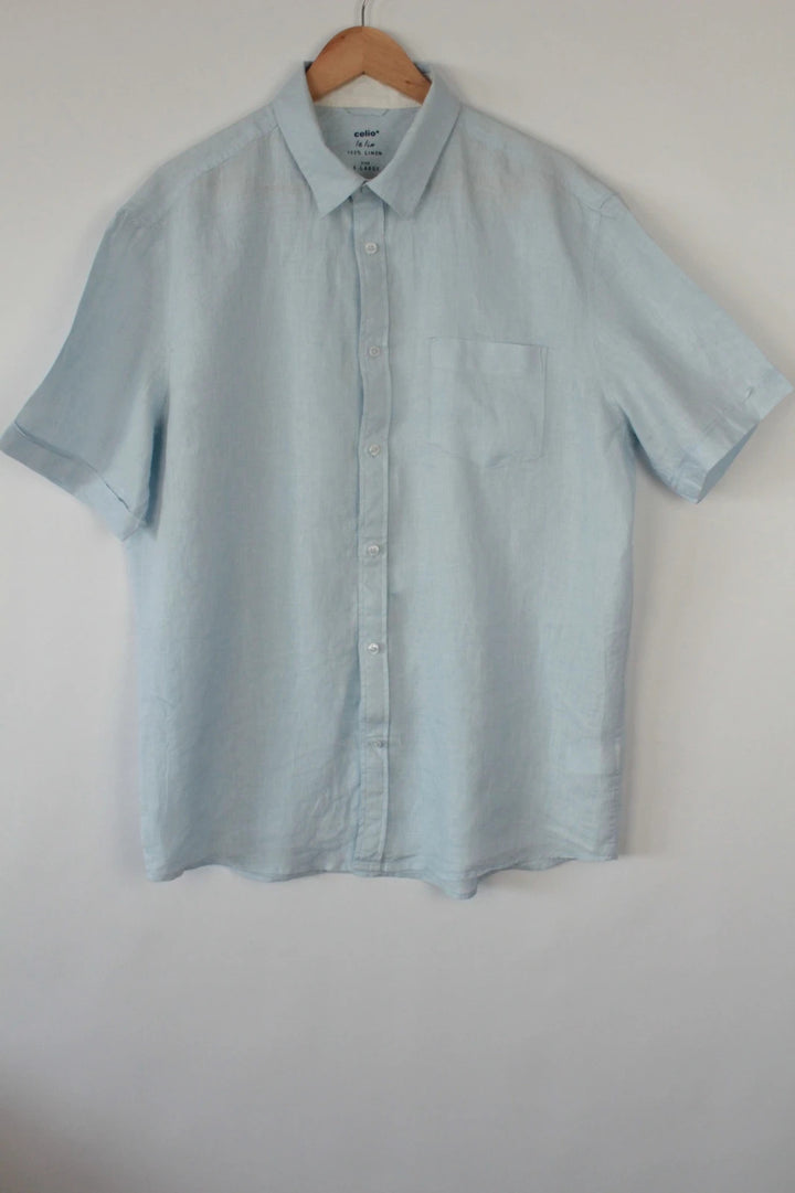 Celio short sleeve shirt baby blue 100% linen with button-down front and relaxed fit.