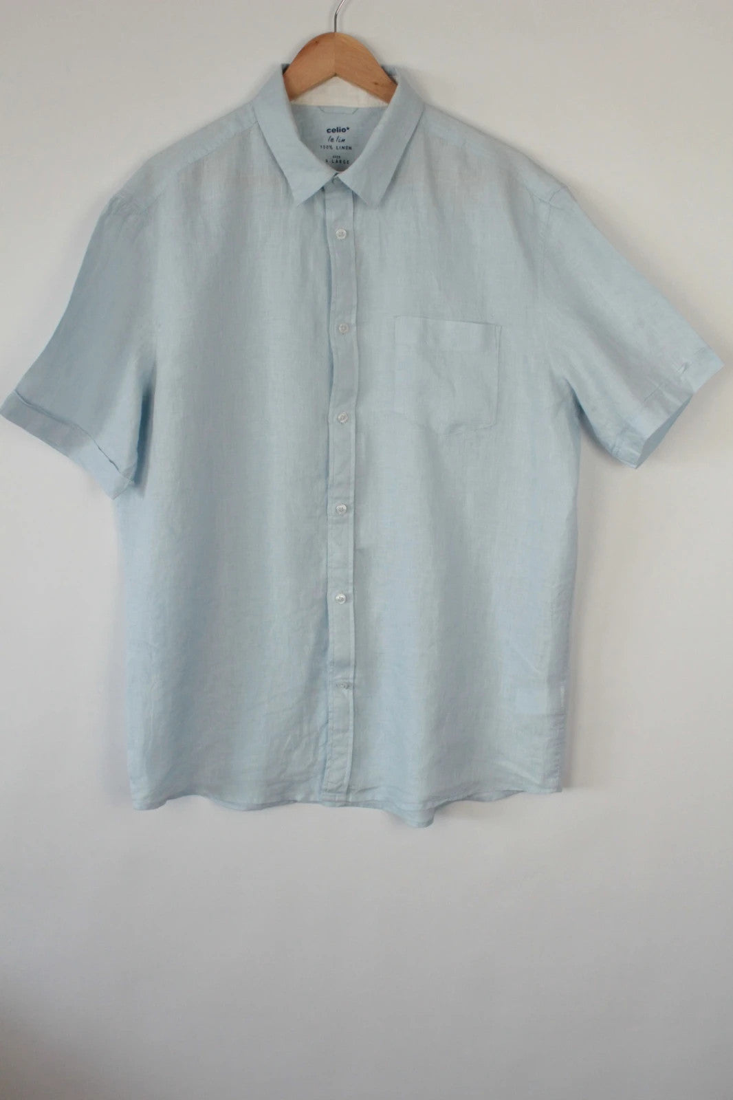 Celio short sleeve shirt baby blue 100% linen with button-down front and relaxed fit.
