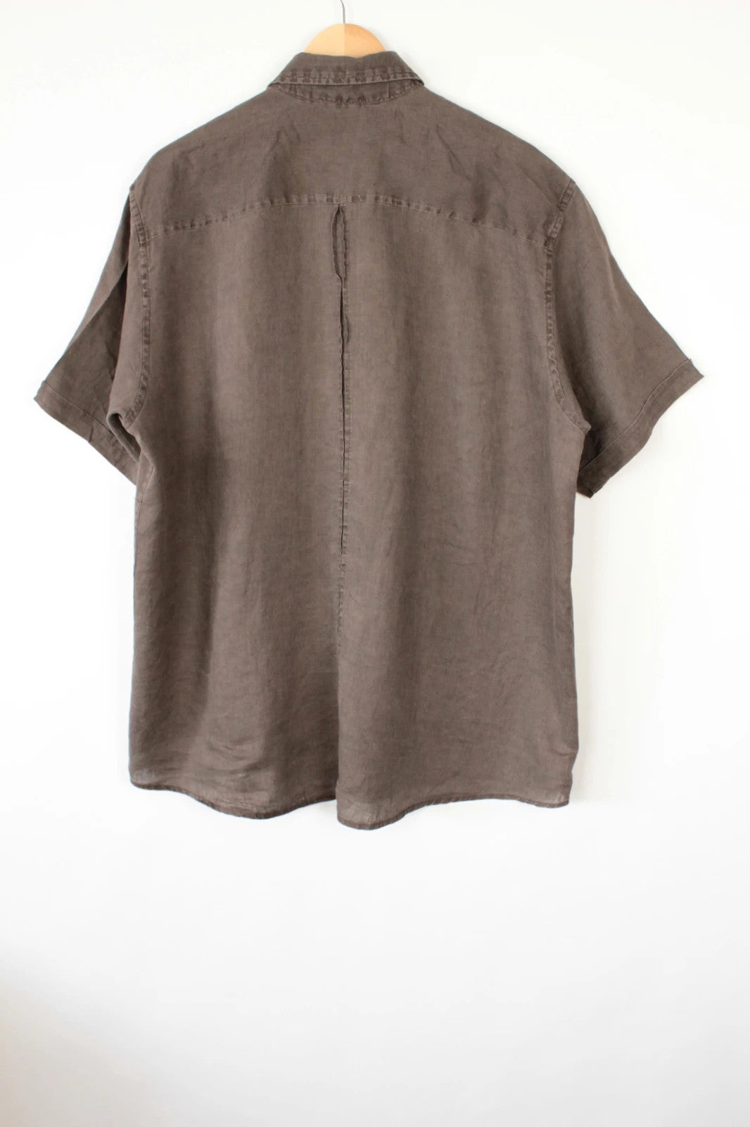 Galeries Lafayette brown short sleeve linen shirt with button-down collar and textured fabric.