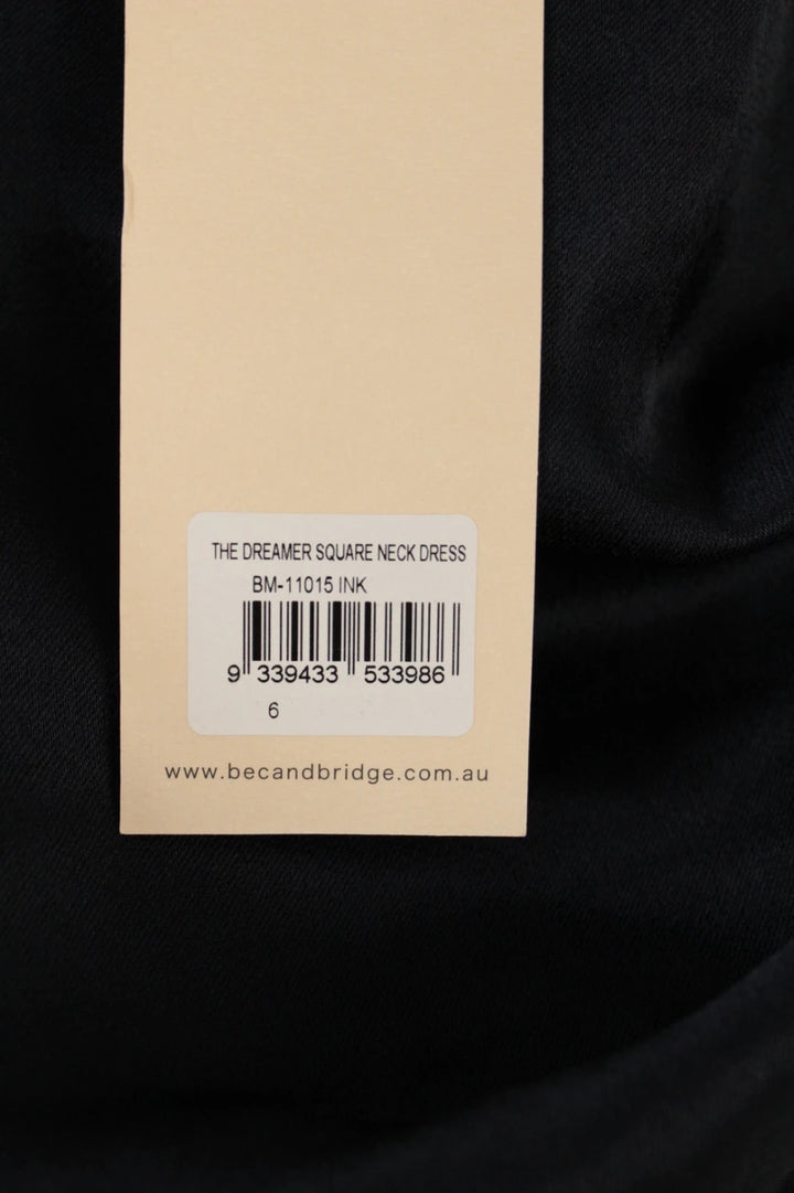 Bec & Bridge deep navy satin maxi dress with square neck and cowl waist detail.