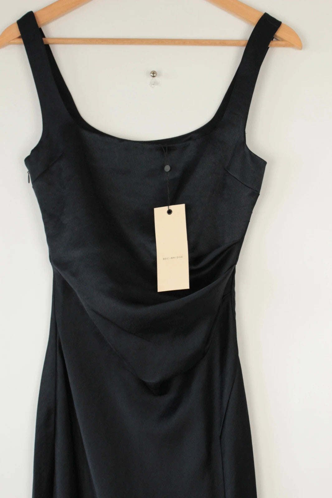 Bec & Bridge deep navy satin maxi dress with square neck and cowl waist detail.