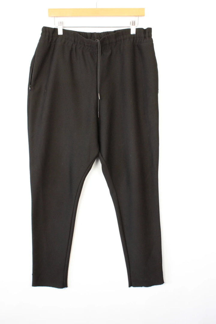AQ/AQ black joggers with drop-crotch design and elasticated drawstring waist.