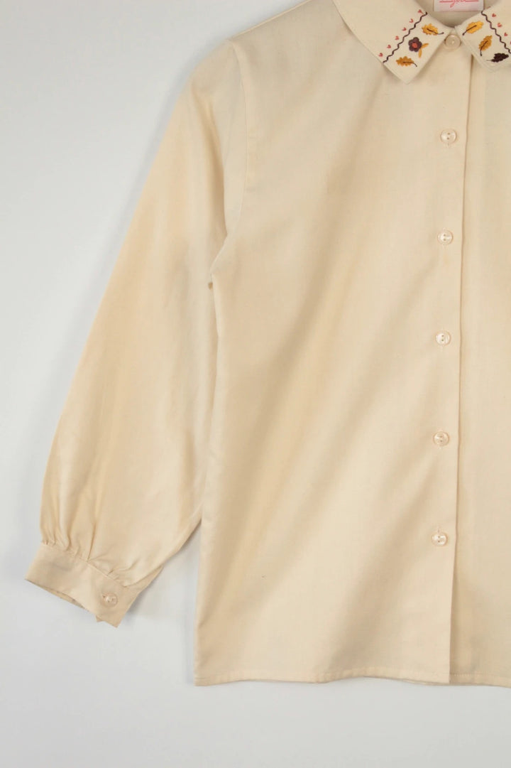 Vintage Dressing cream tunic blouse with embroidered Peter Pan collar and balloon sleeves.