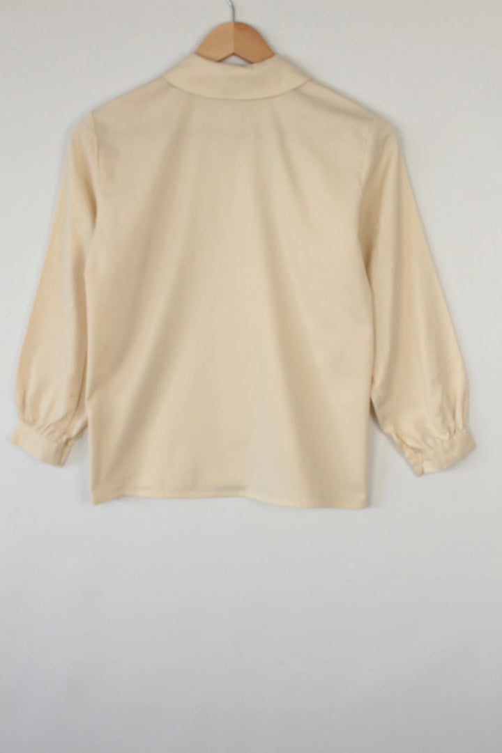 Vintage Dressing cream tunic blouse with embroidered Peter Pan collar and balloon sleeves.
