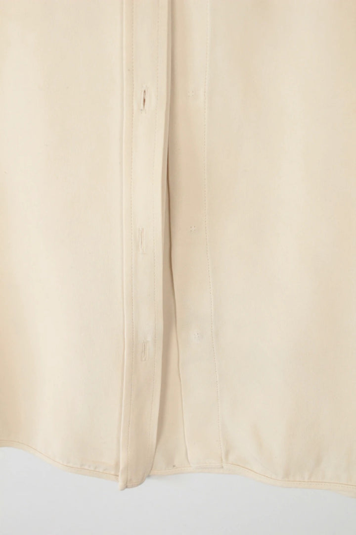 Max Mara cream silk blouse long sleeve with hidden placket and minimalist design.