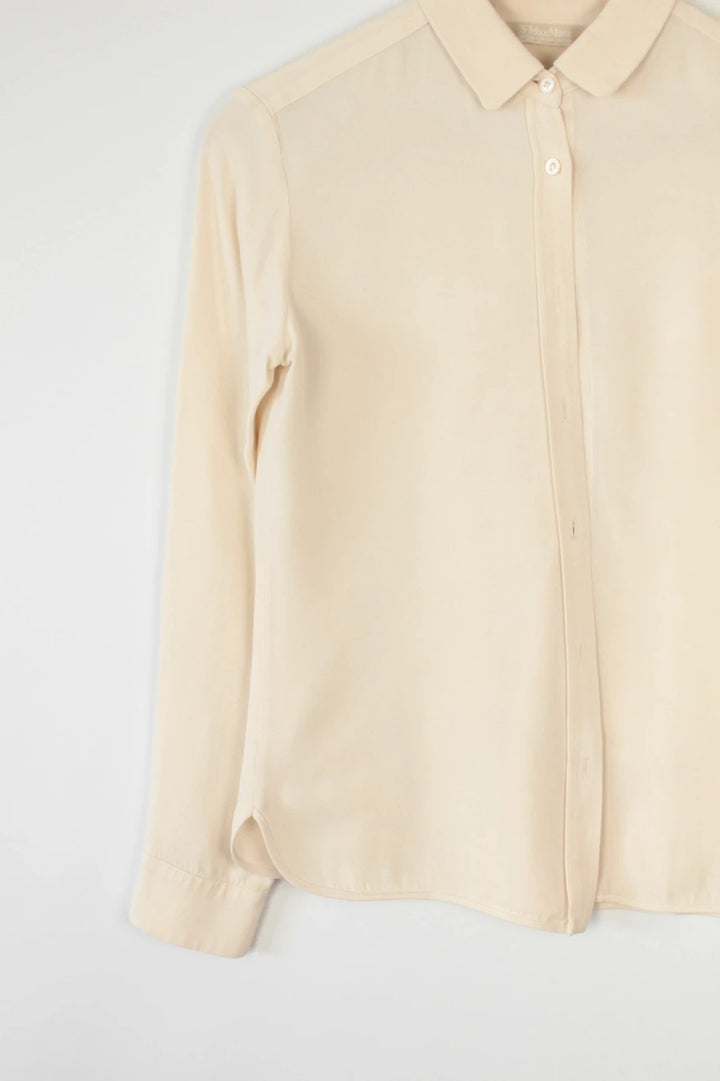 Max Mara cream silk blouse long sleeve with hidden placket and minimalist design.
