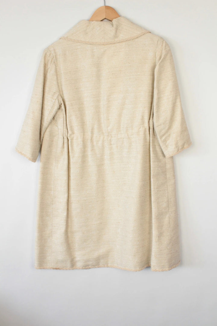 Vintage Dressing beige duster coat open front bouclé tweed textured fabric elegant drape.