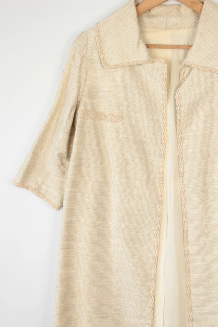 Vintage Dressing beige duster coat open front bouclé tweed textured fabric elegant drape.