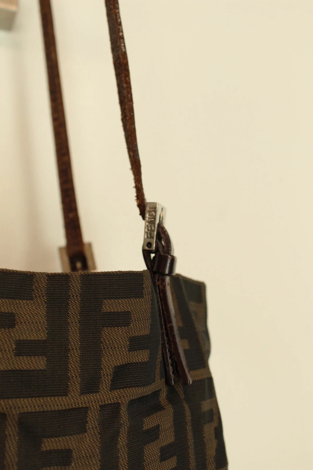 Fendi brown monogram shoulder bag with FF logo, jacquard canvas and leather trim.