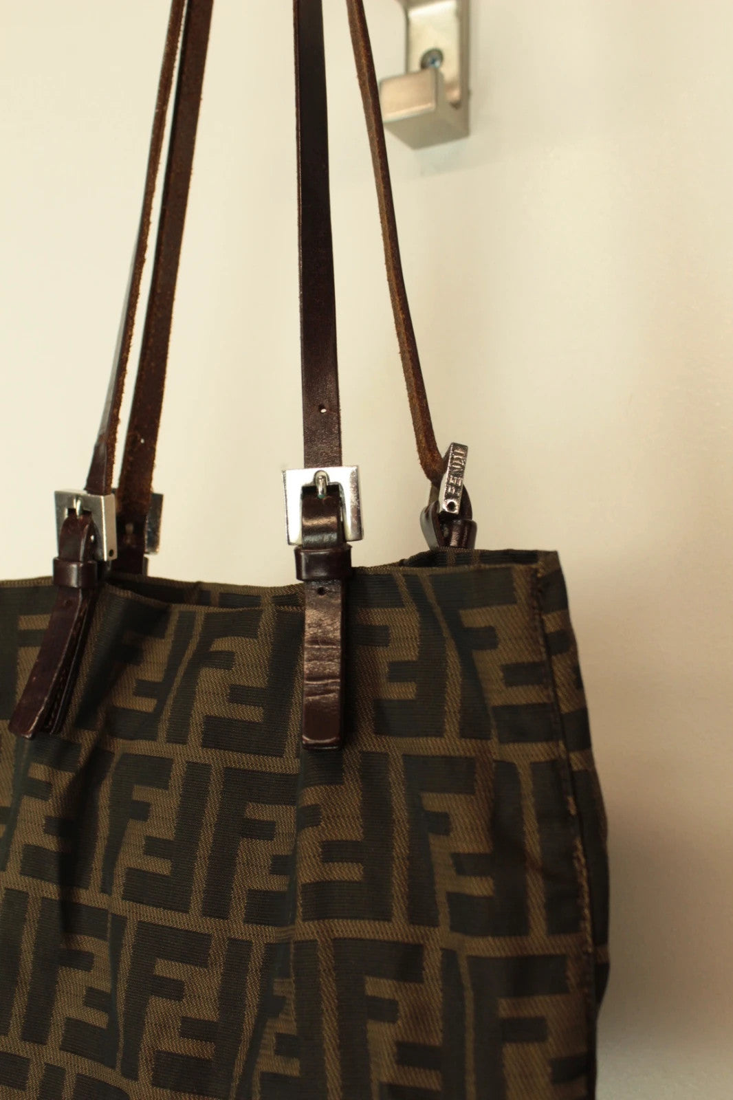 Fendi brown monogram shoulder bag with FF logo, jacquard canvas and leather trim.