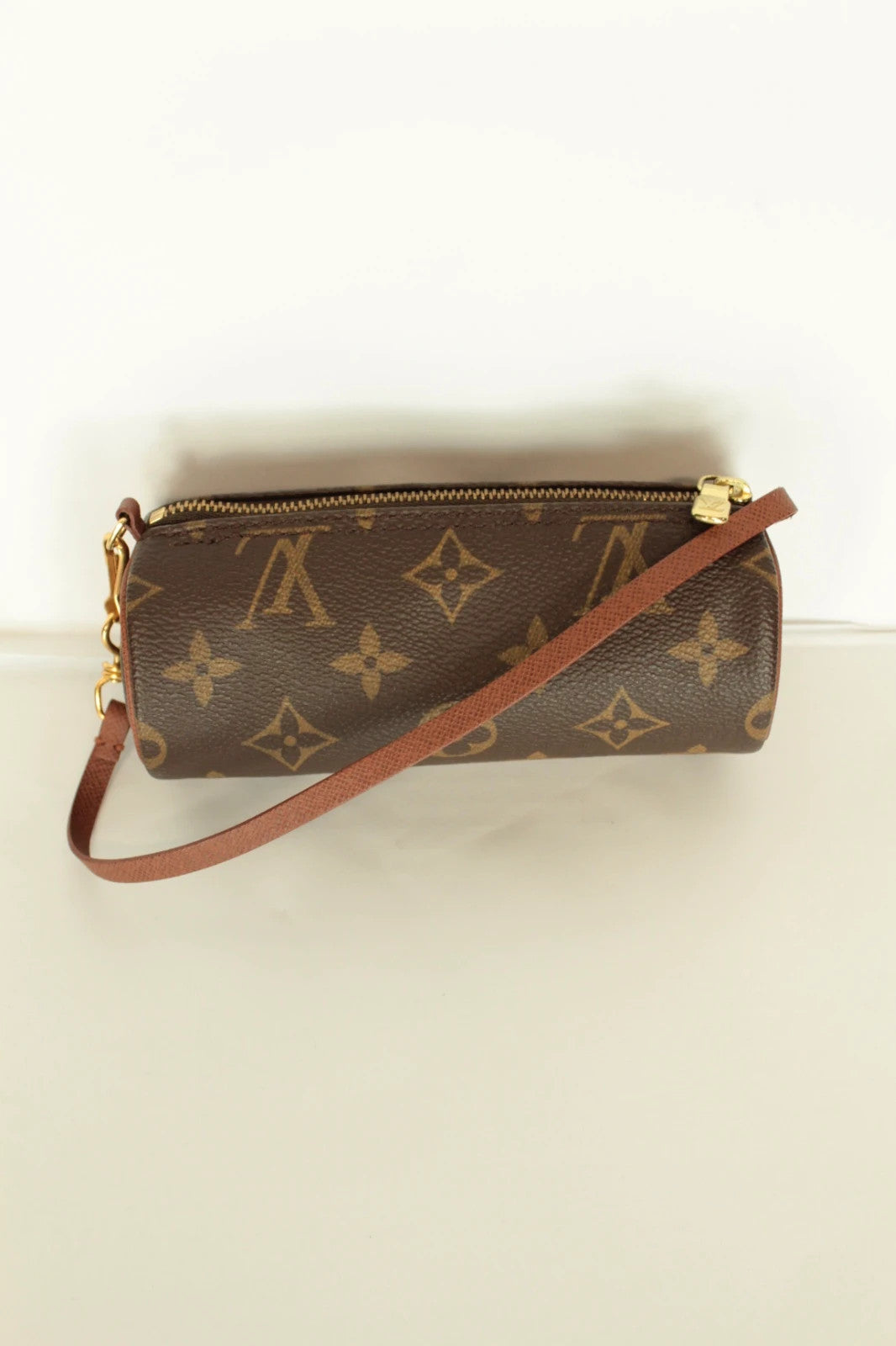 Louis Vuitton brown handbag with monogram pattern, coated canvas, and gold-tone hardware.