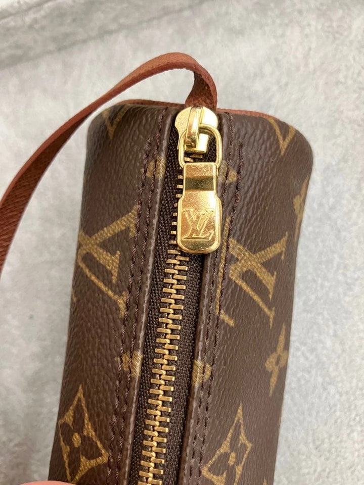 Louis Vuitton brown handbag with monogram pattern, coated canvas, and gold-tone hardware.