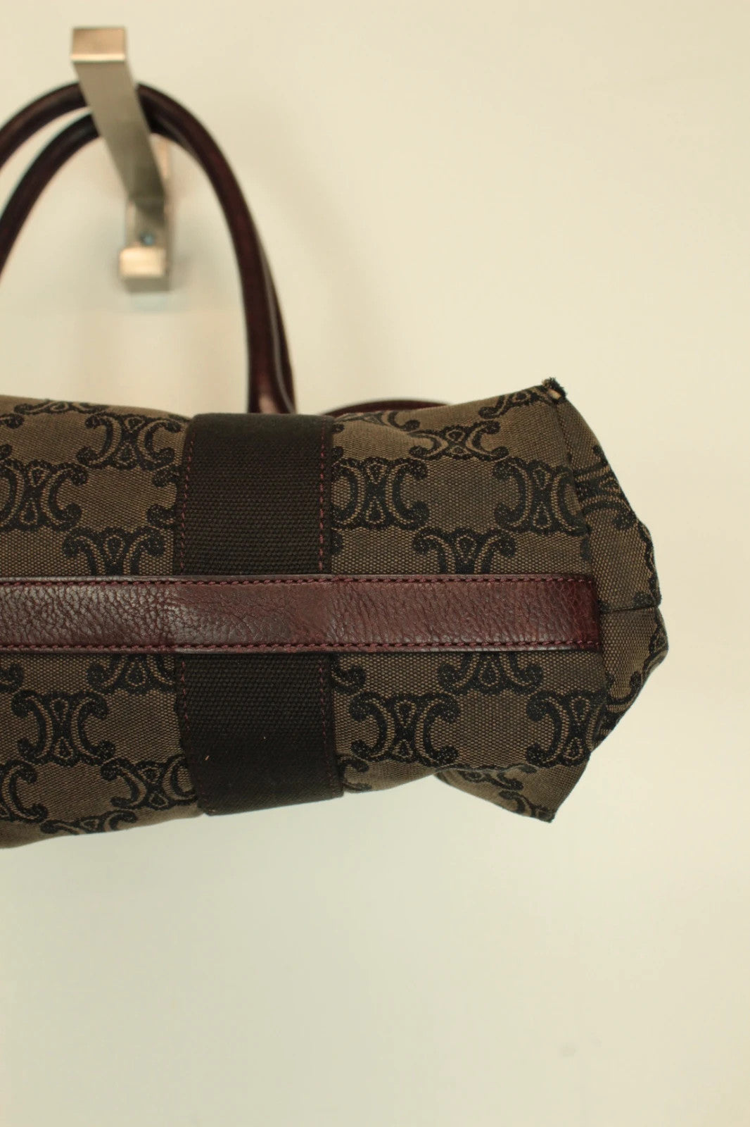 Celine black and brown canvas tote bag with Triomphe monogram and leather trim.