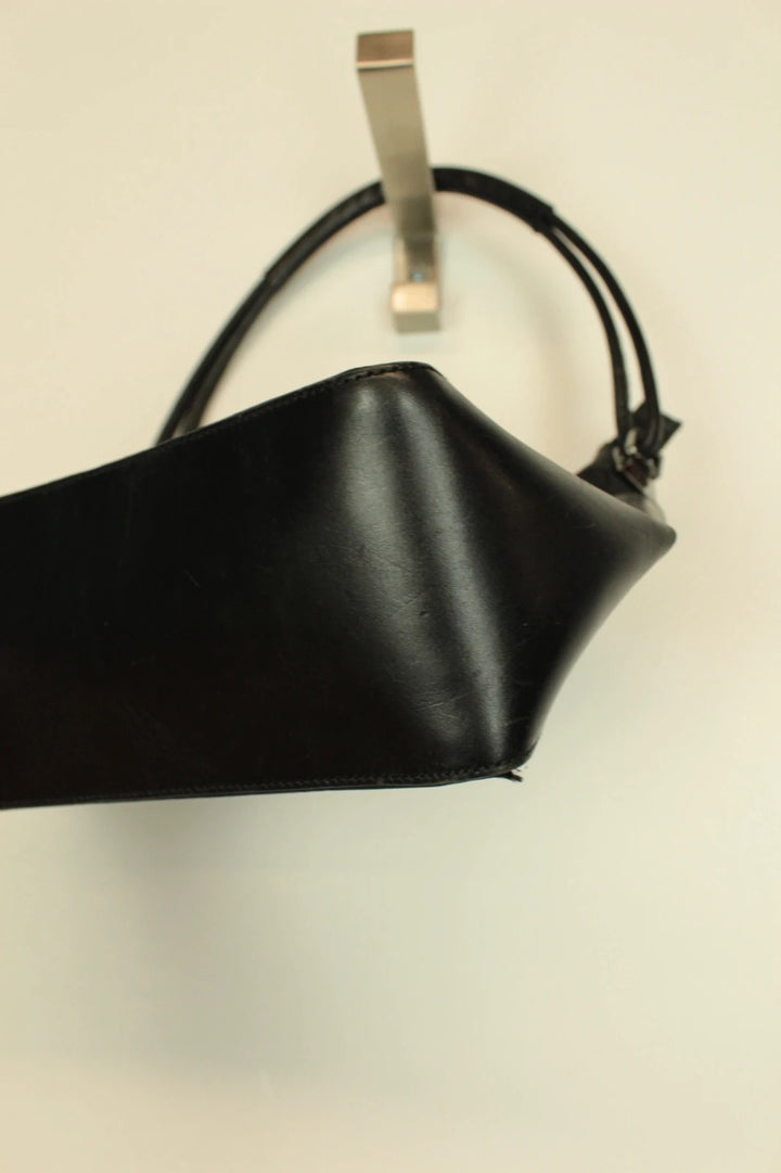 Gucci black hobo shoulder bag with GG monogram pattern and leather trim.
