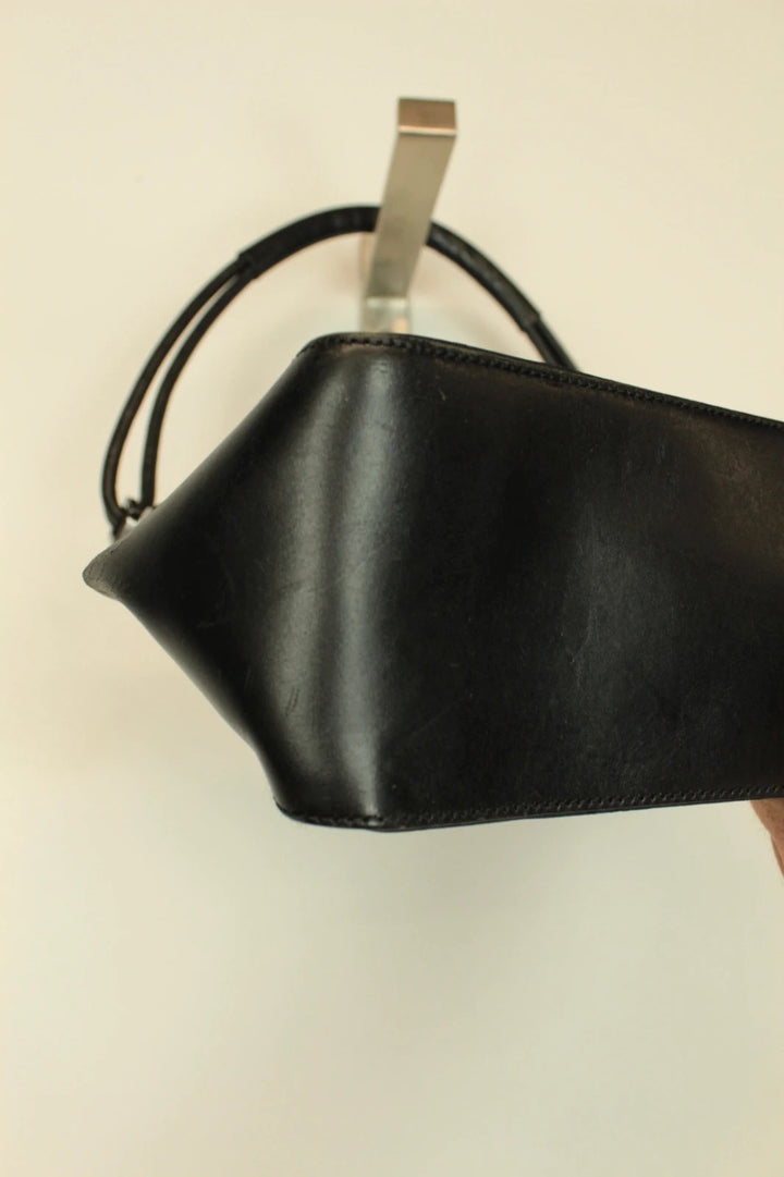 Gucci black hobo shoulder bag with GG monogram pattern and leather trim.