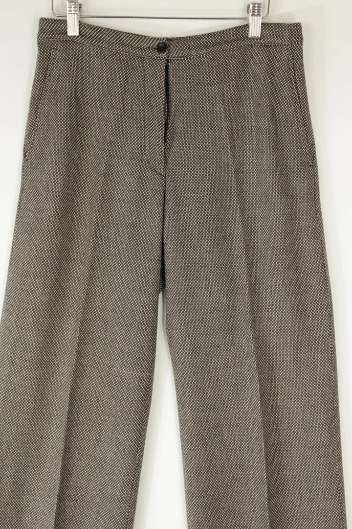 Dries Van Noten beige brown tailored wide-leg trousers with micro-pattern and pressed crease.