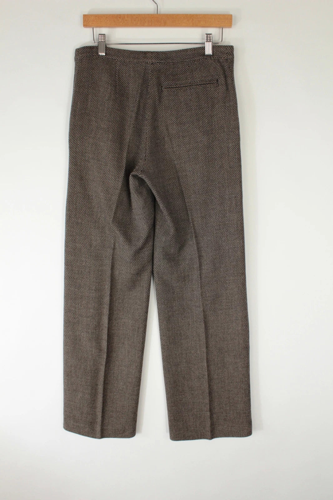 Dries Van Noten beige brown tailored wide-leg trousers with micro-pattern and pressed crease.