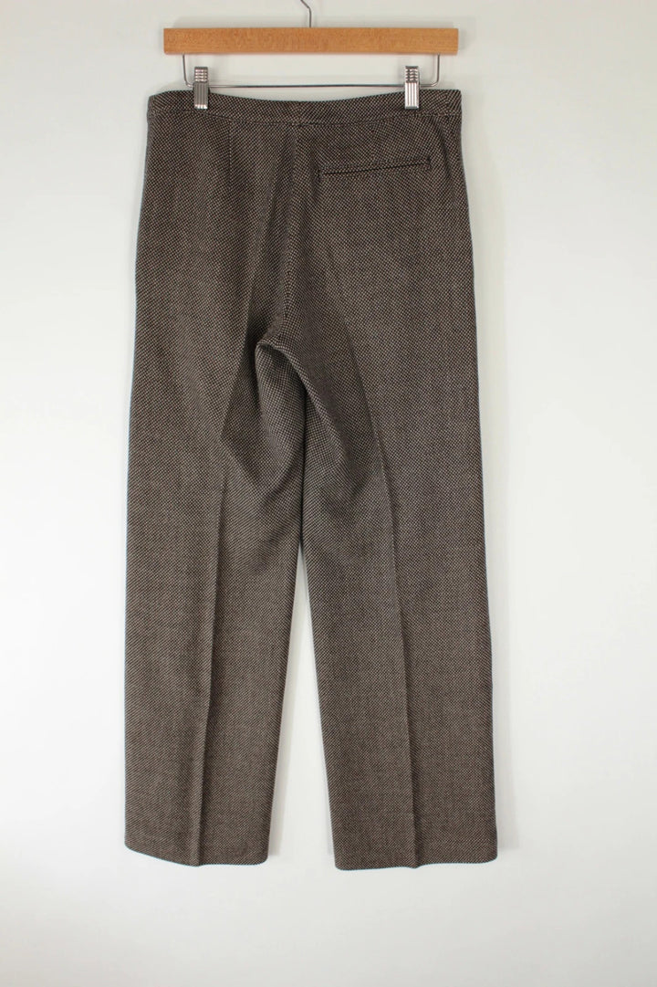 Dries Van Noten beige brown tailored wide-leg trousers with micro-pattern and pressed crease.
