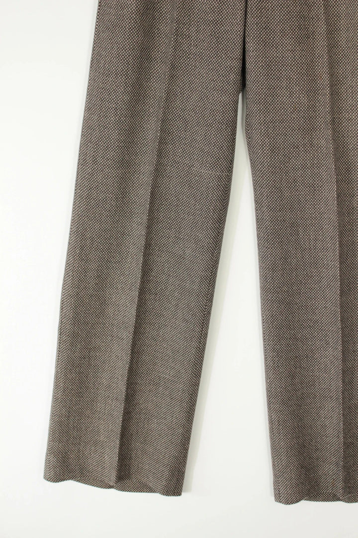 Dries Van Noten beige brown tailored wide-leg trousers with micro-pattern and pressed crease.