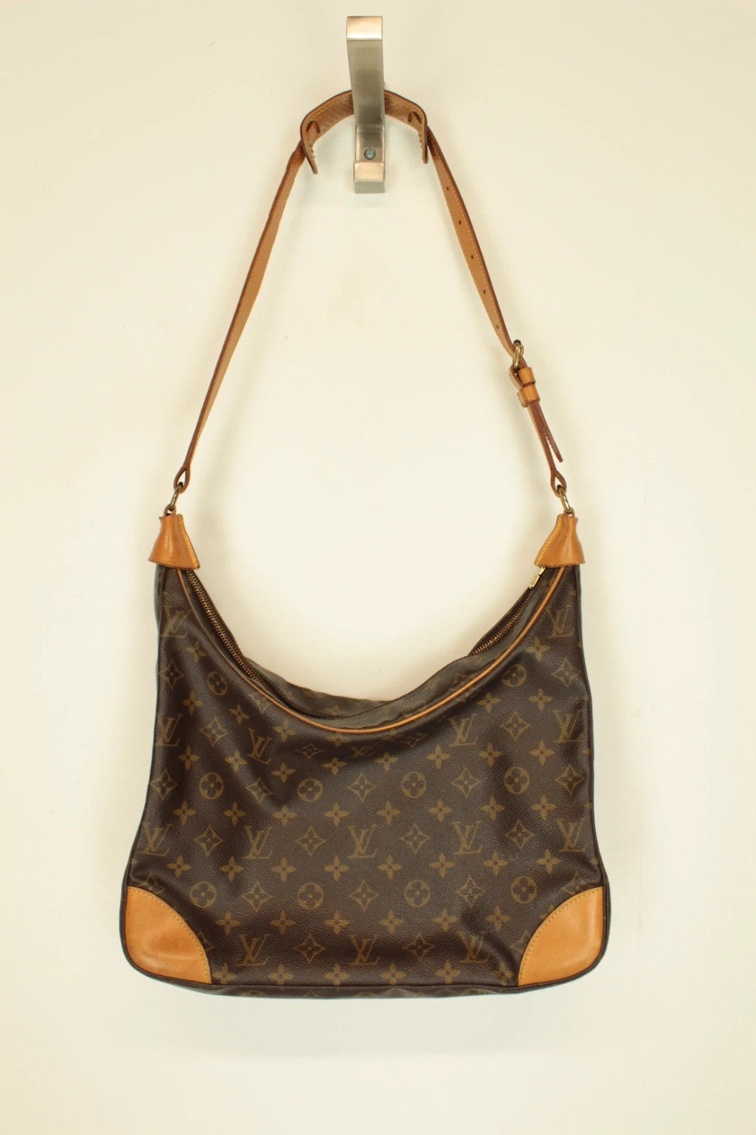 Louis Vuitton hobo bag black brown monogram canvas with vachetta leather trim and gold hardware.