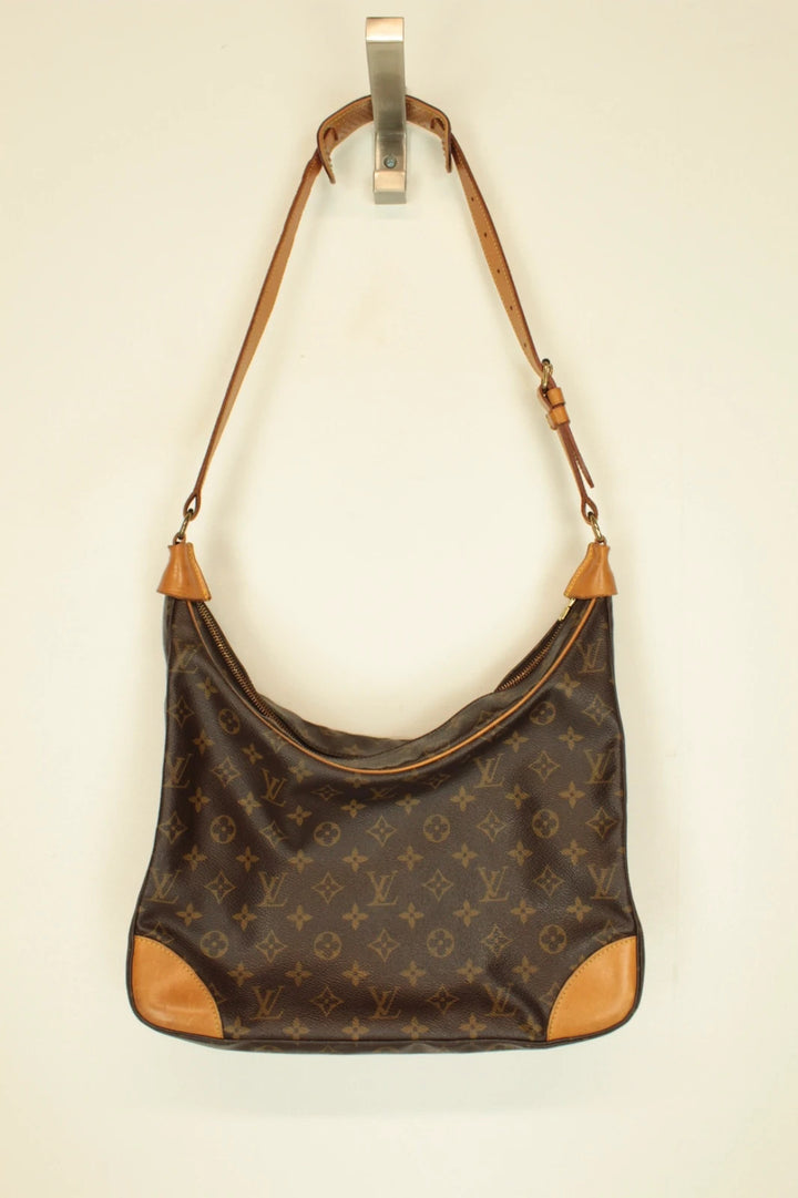 Louis Vuitton hobo bag black brown monogram canvas with vachetta leather trim and gold hardware.