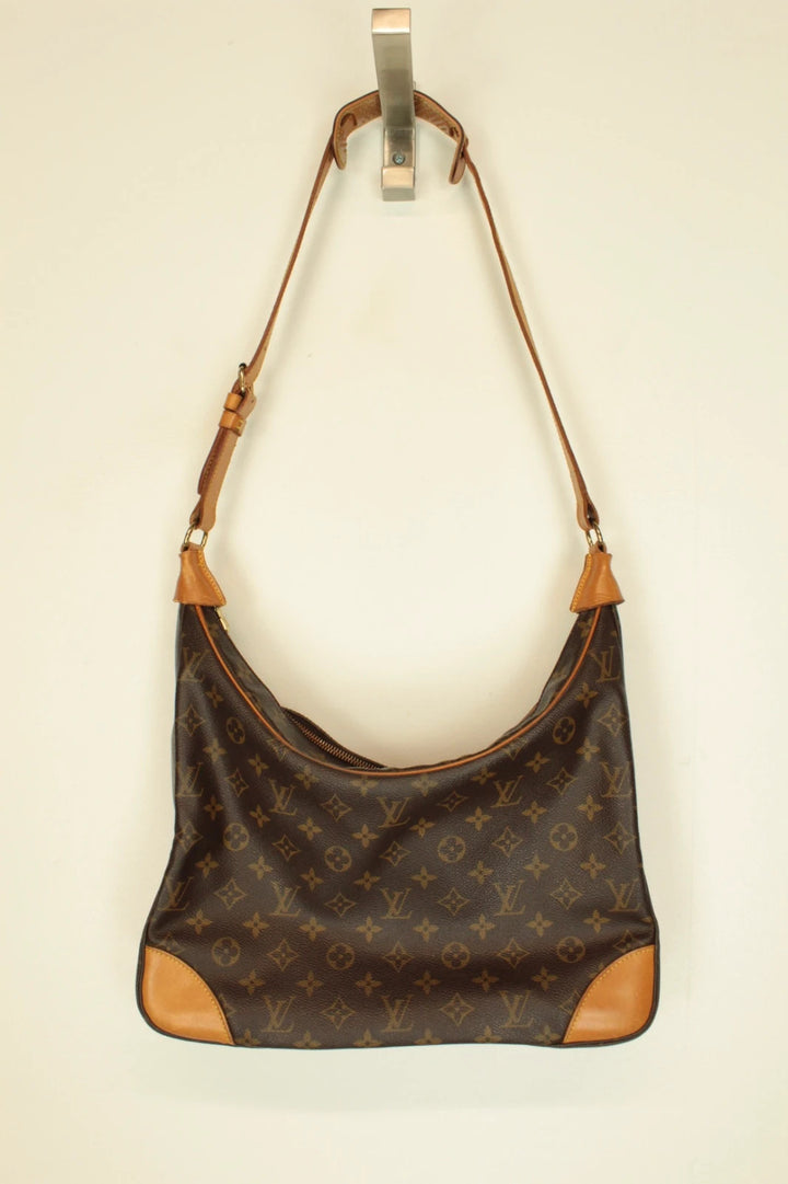 Louis Vuitton hobo bag black brown monogram canvas with vachetta leather trim and gold hardware.
