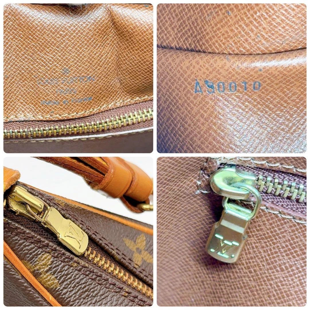 Louis Vuitton hobo bag black brown monogram canvas with vachetta leather trim and gold hardware.