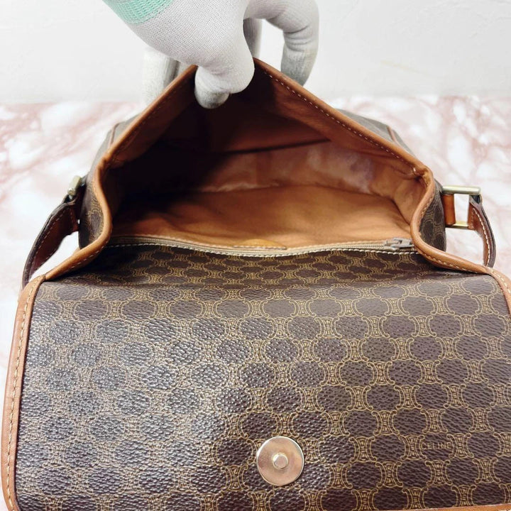 Celine beige and brown vintage leather crossbody bag with silver circle logo and smooth trim.