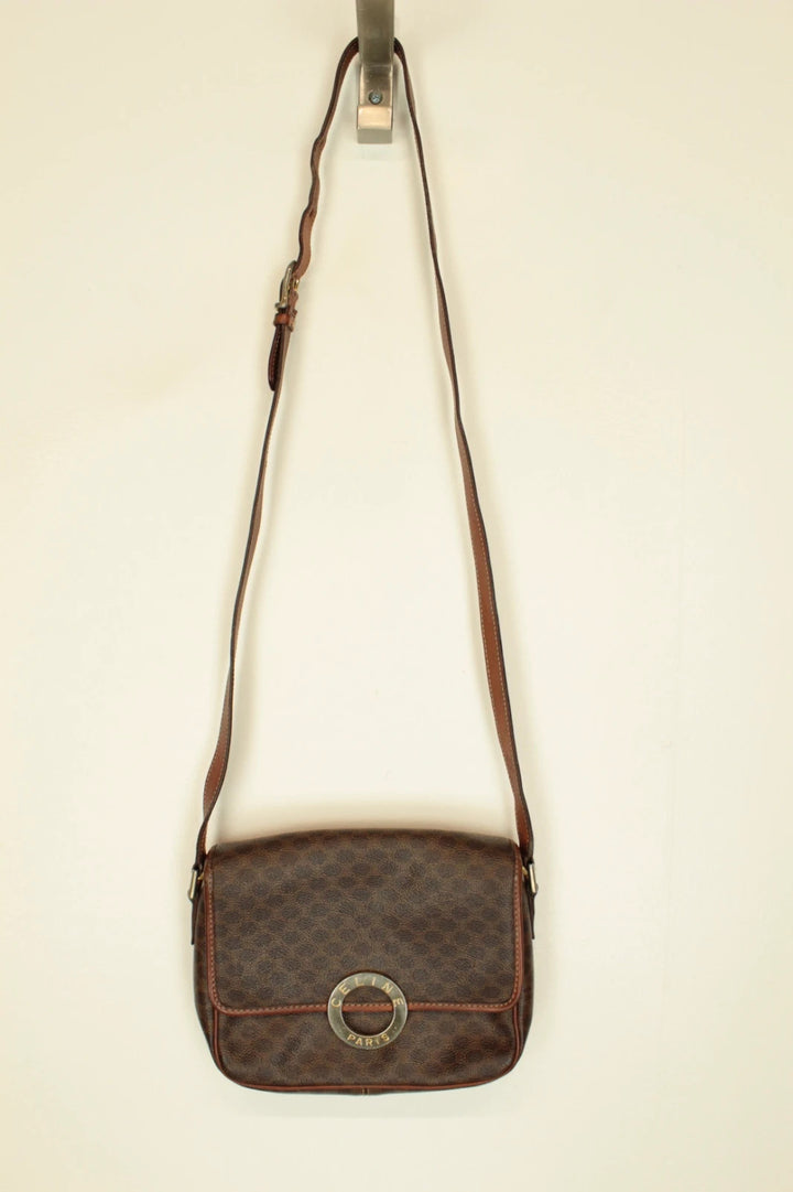 Celine beige and brown vintage leather crossbody bag with silver circle logo and smooth trim.