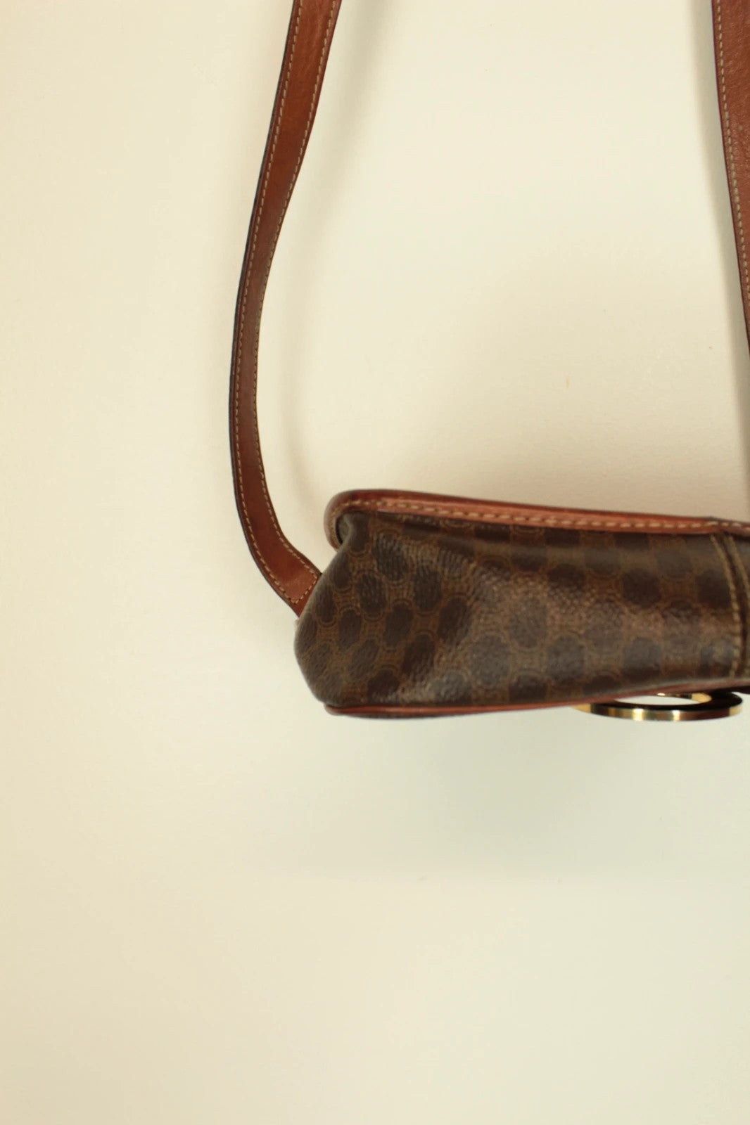 Celine beige and brown vintage leather crossbody bag with silver circle logo and smooth trim.