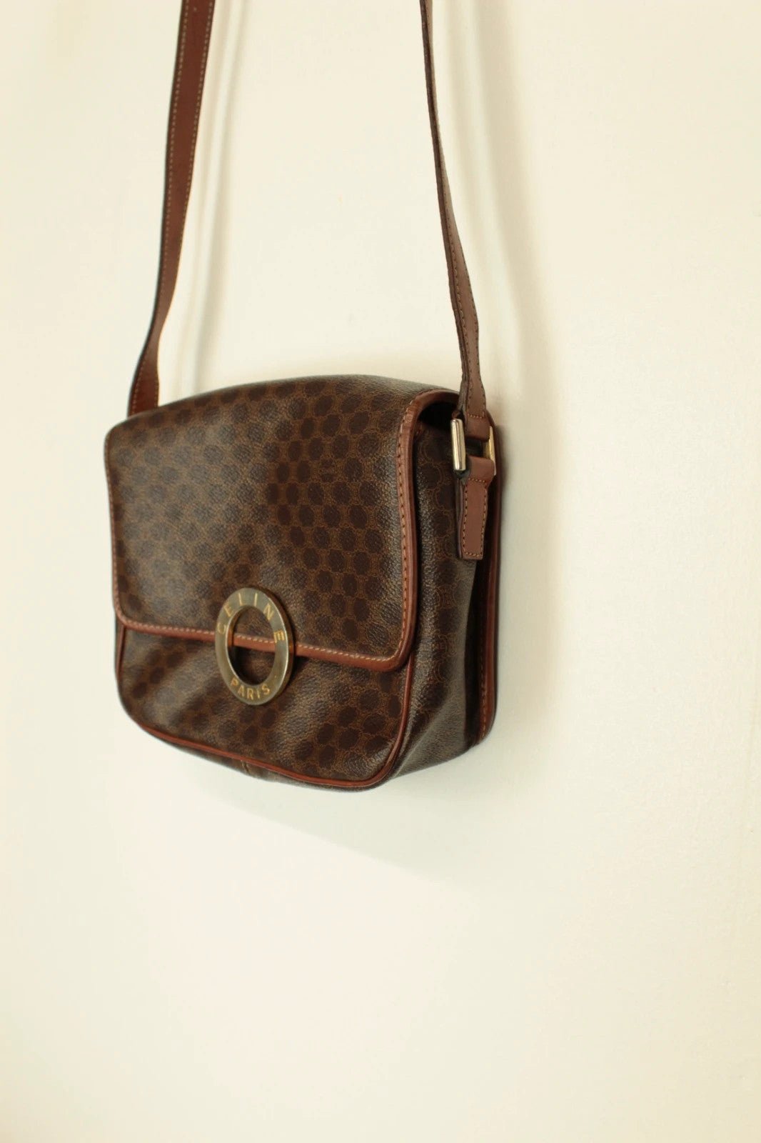 Celine beige and brown vintage leather crossbody bag with silver circle logo and smooth trim.