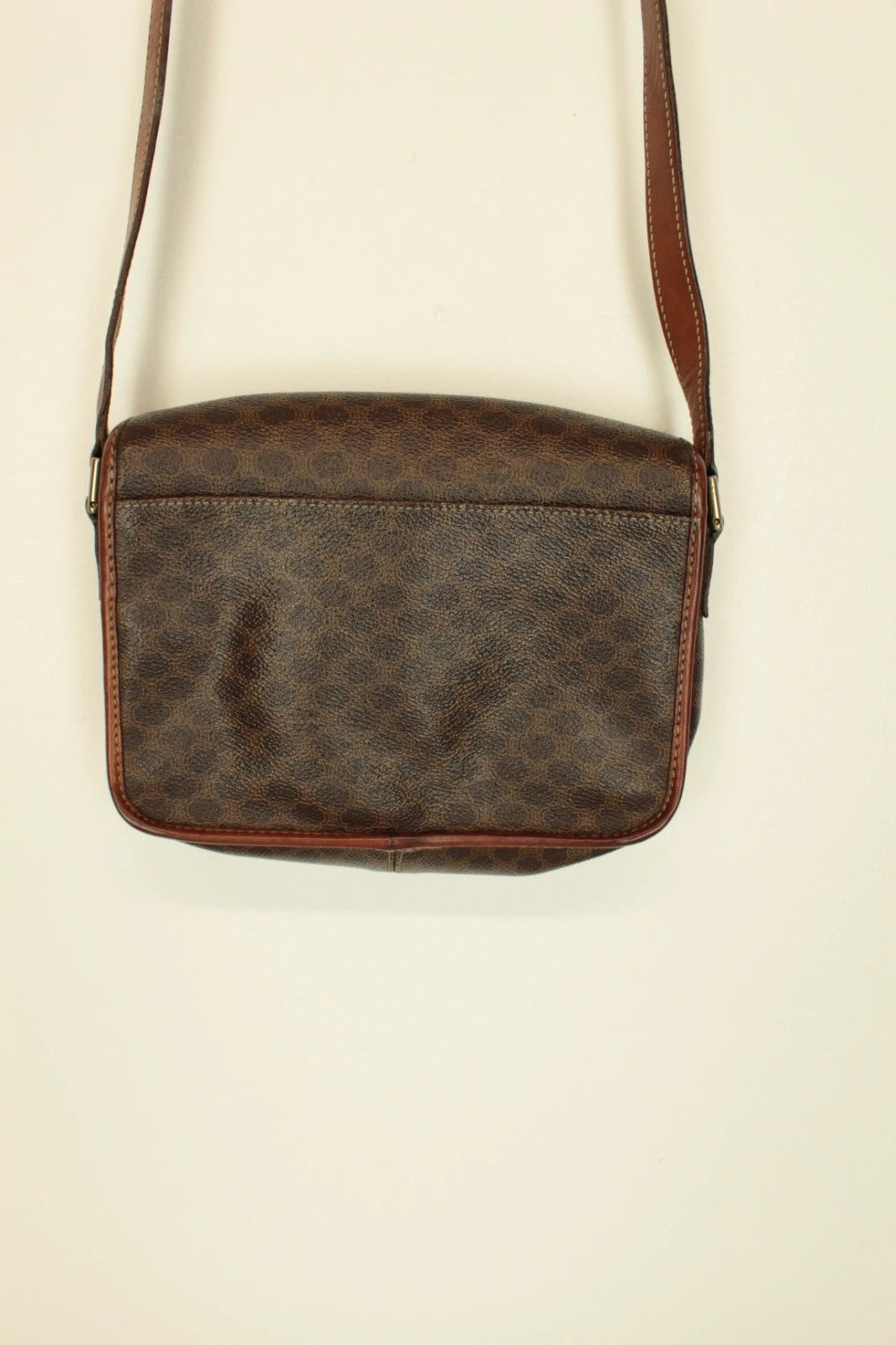 Celine beige and brown vintage leather crossbody bag with silver circle logo and smooth trim.