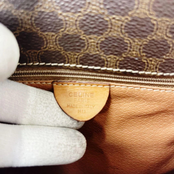Celine beige and brown vintage leather crossbody bag with silver circle logo and smooth trim.