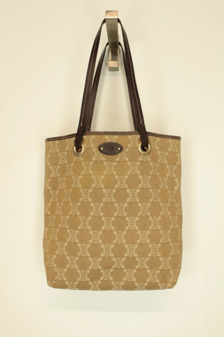Celine beige and brown tote bag with Triomphe monogram canvas and leather trim.