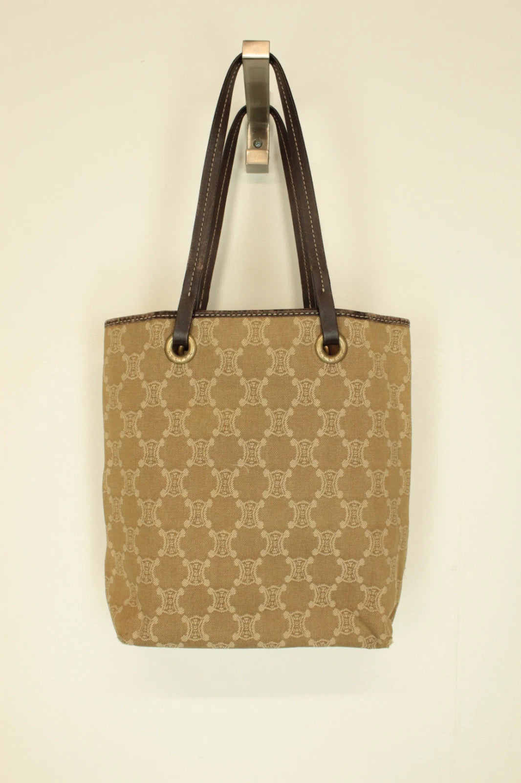 Celine beige and brown tote bag with Triomphe monogram canvas and leather trim.
