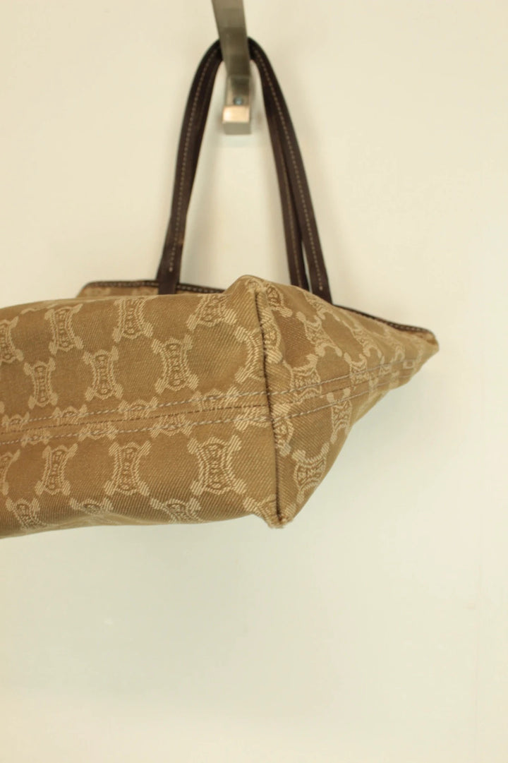 Celine beige and brown tote bag with Triomphe monogram canvas and leather trim.