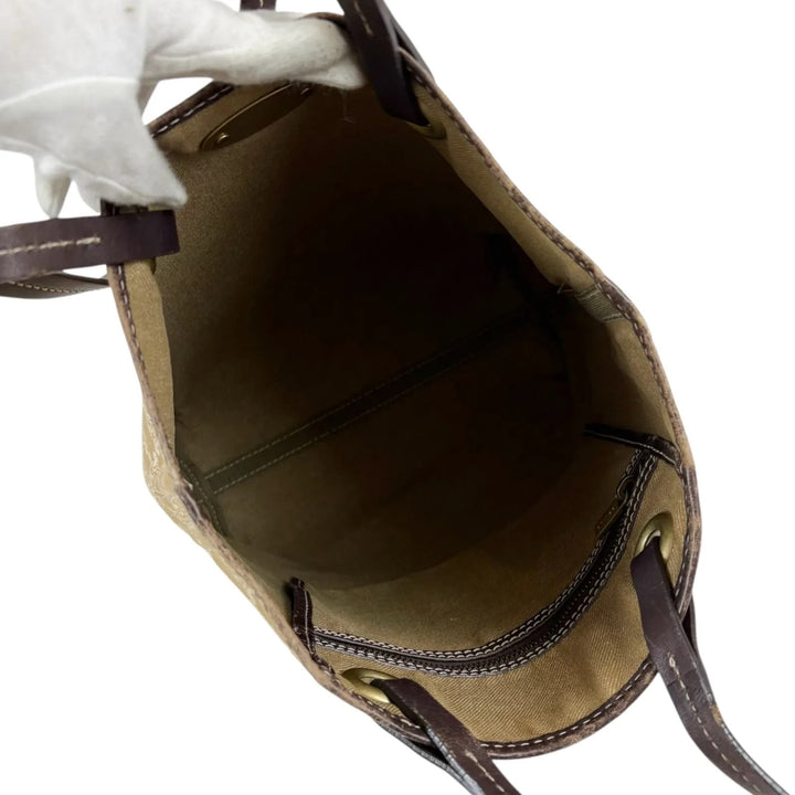 Celine beige and brown tote bag with Triomphe monogram canvas and leather trim.