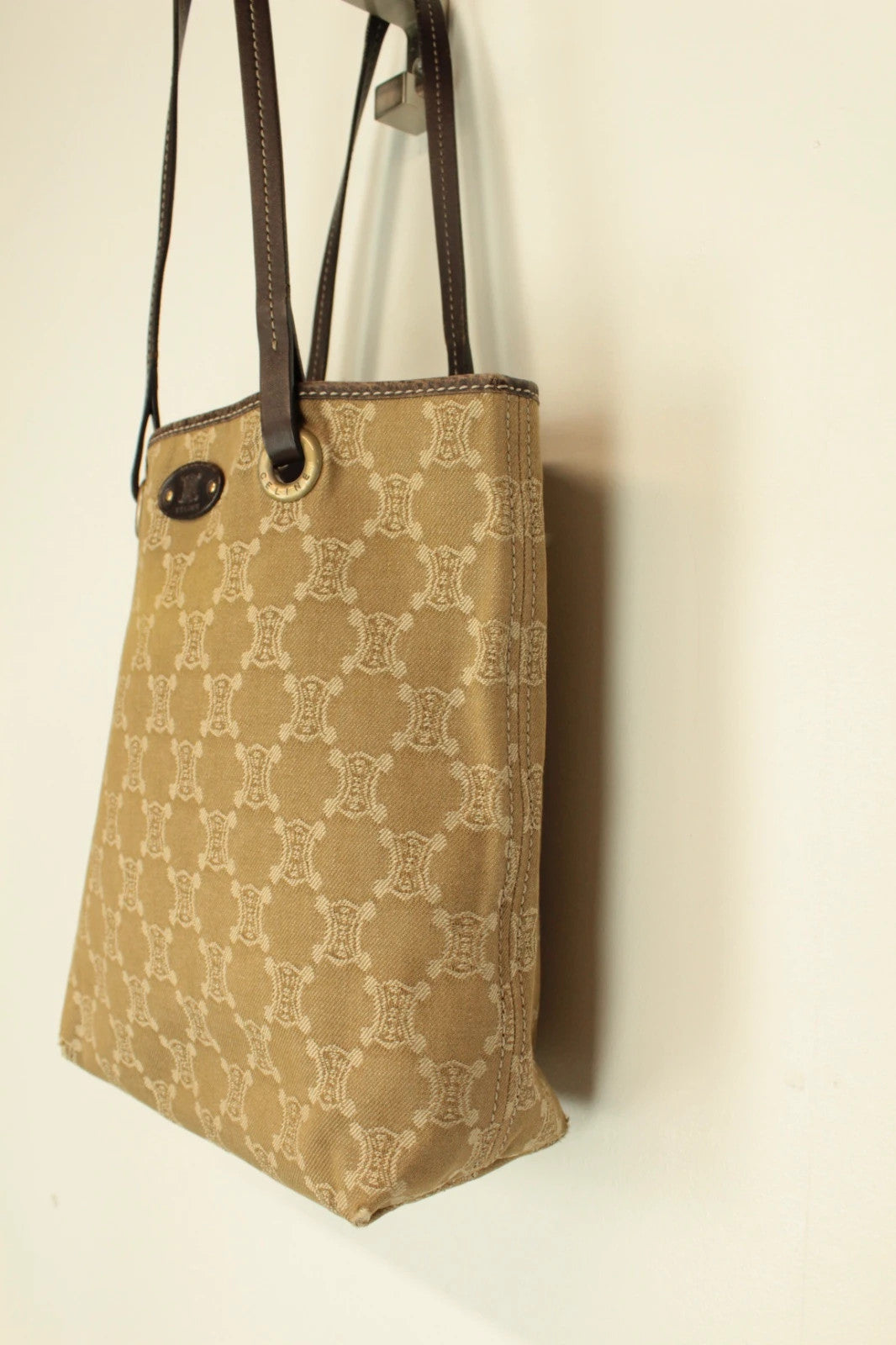 Celine beige and brown tote bag with Triomphe monogram canvas and leather trim.