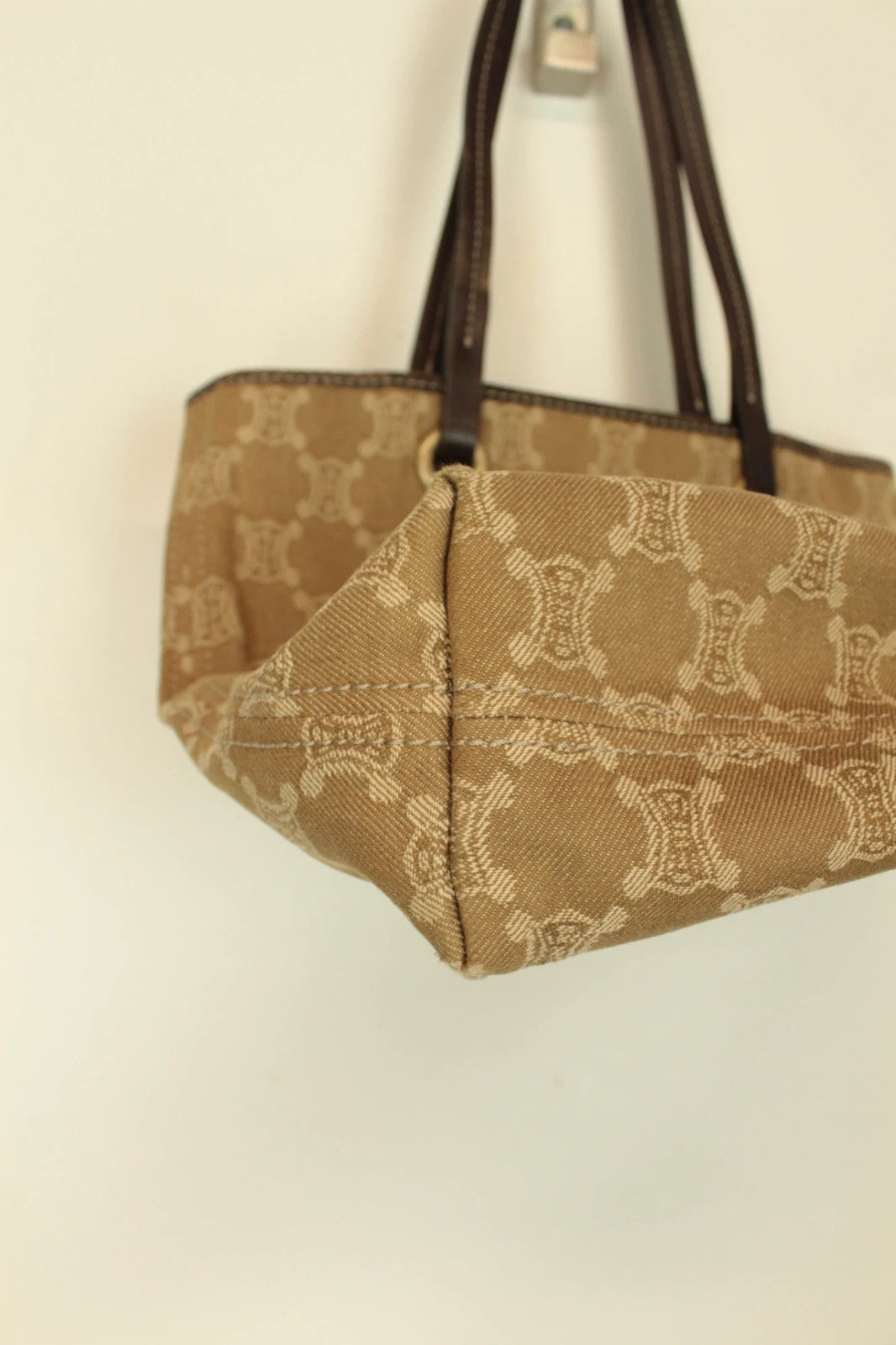 Celine beige and brown tote bag with Triomphe monogram canvas and leather trim.