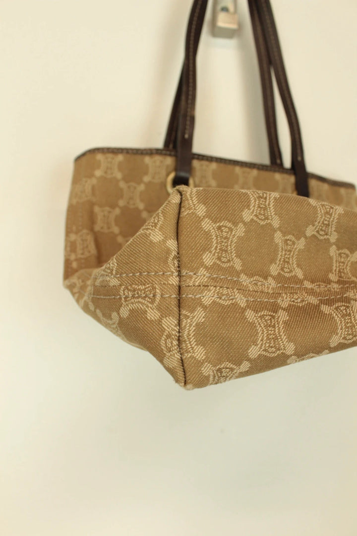 Celine beige and brown tote bag with Triomphe monogram canvas and leather trim.