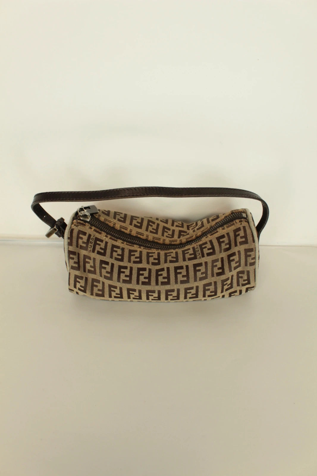 Fendi beige and brown mini cylinder barrel bag with FF monogram jacquard canvas and leather trim.
