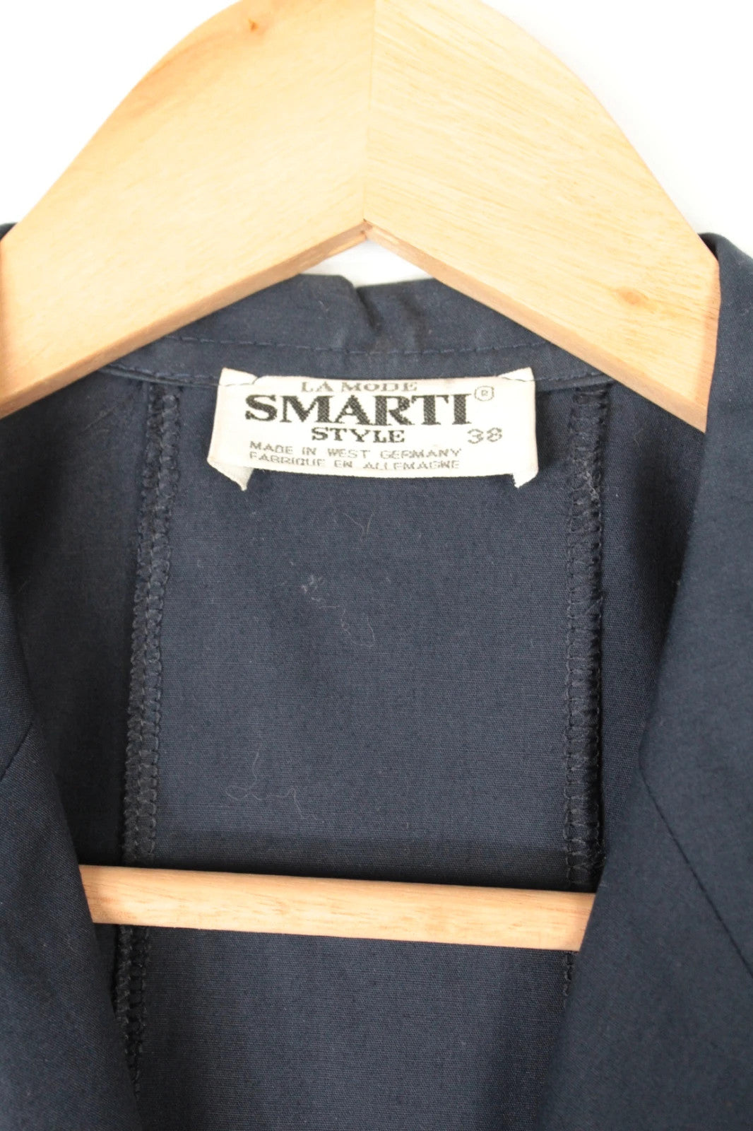 La Mode Smarti Style navy trench dress, double-breasted, with matching belt and white buttons.