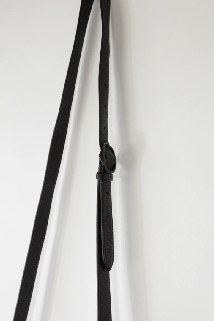 Coach black Tabby 20 clutch bag in polished pebble leather with pewter C logo hardware.