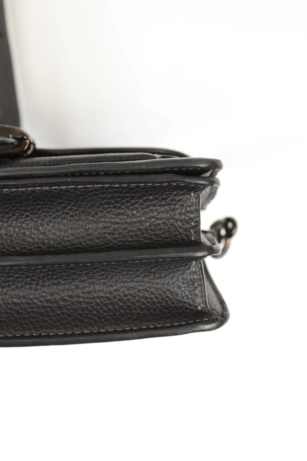 Coach black Tabby 20 clutch bag in polished pebble leather with pewter C logo hardware.