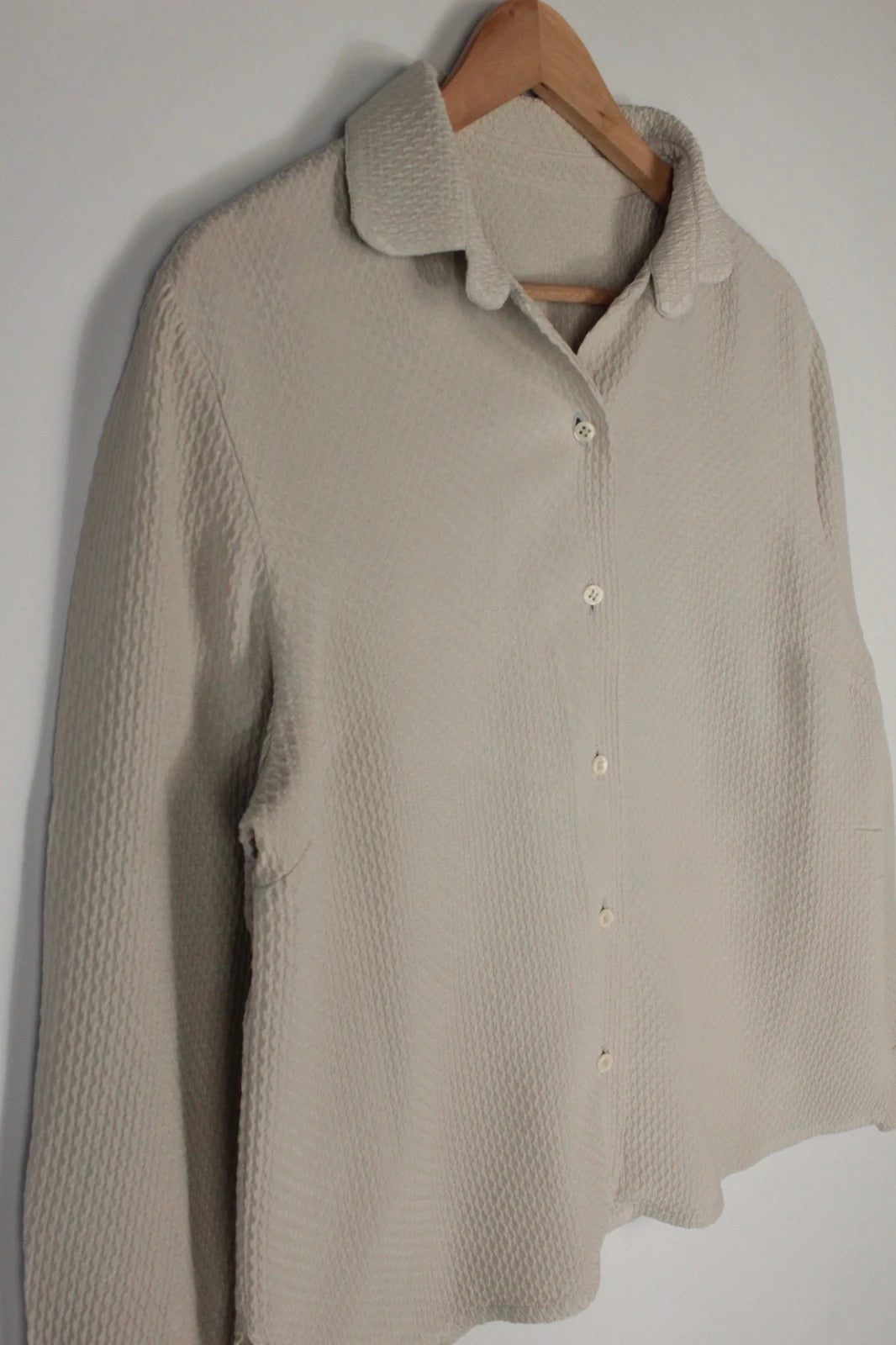 Vintage Dressing beige crinkle blouse with textured waffle fabric and classic button-up front.