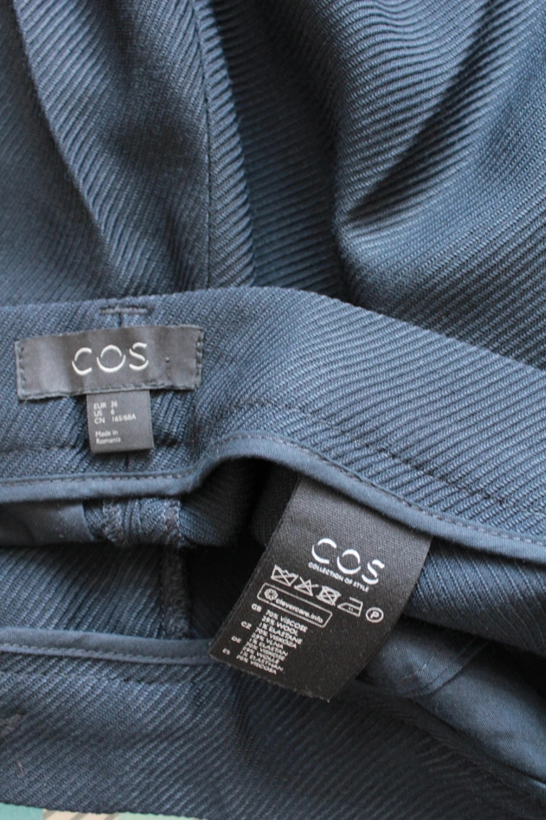 COS high-waisted tailored trousers black grey premium wool blend pleated design